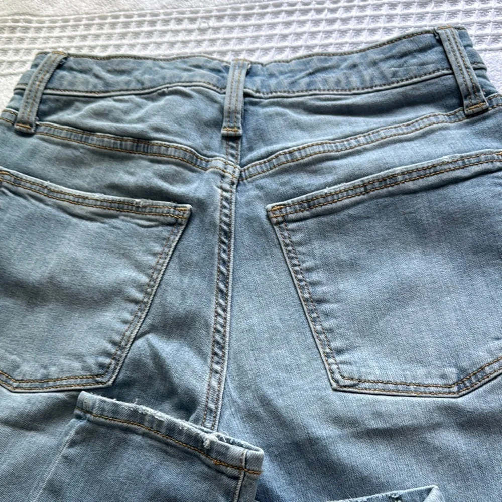 Universal Thread Blue High Rise Distressed Jeans - Picture 6 of 9